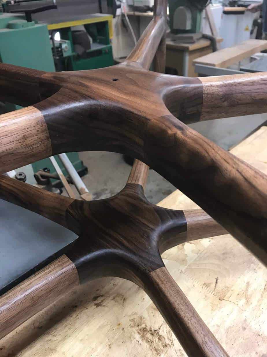 photo of finished legs for a walnut coffee table in a workshop