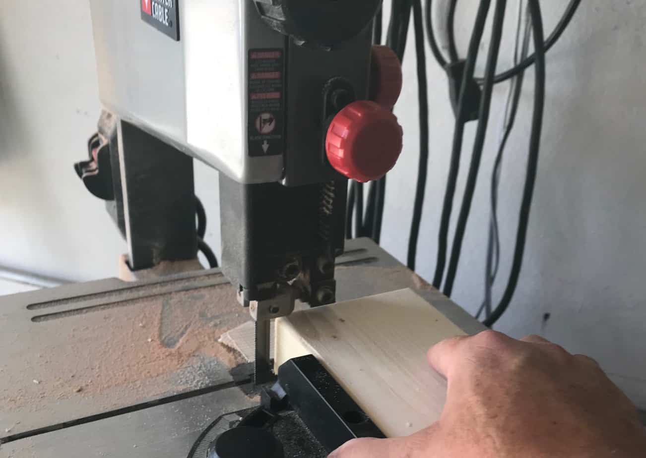 photo of a bandsaw cutting wood