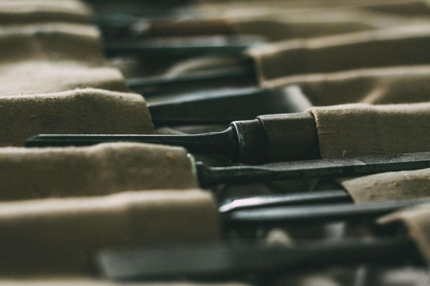 photo of a chisel set laying on their side.