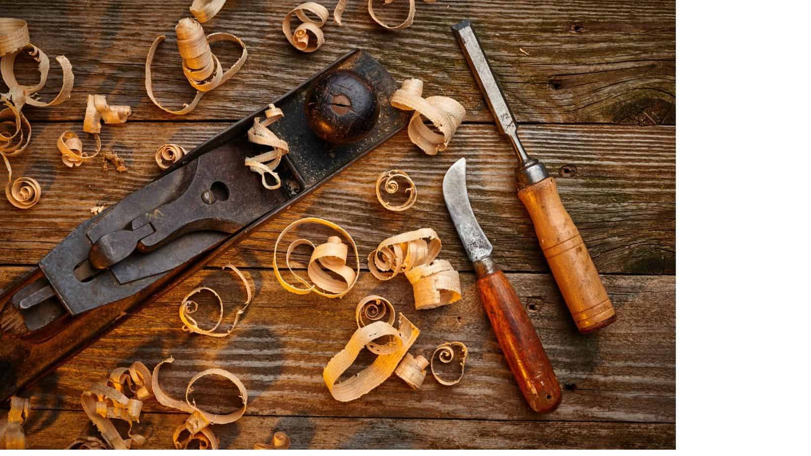 Photo of a woodworking plane and other carving tools